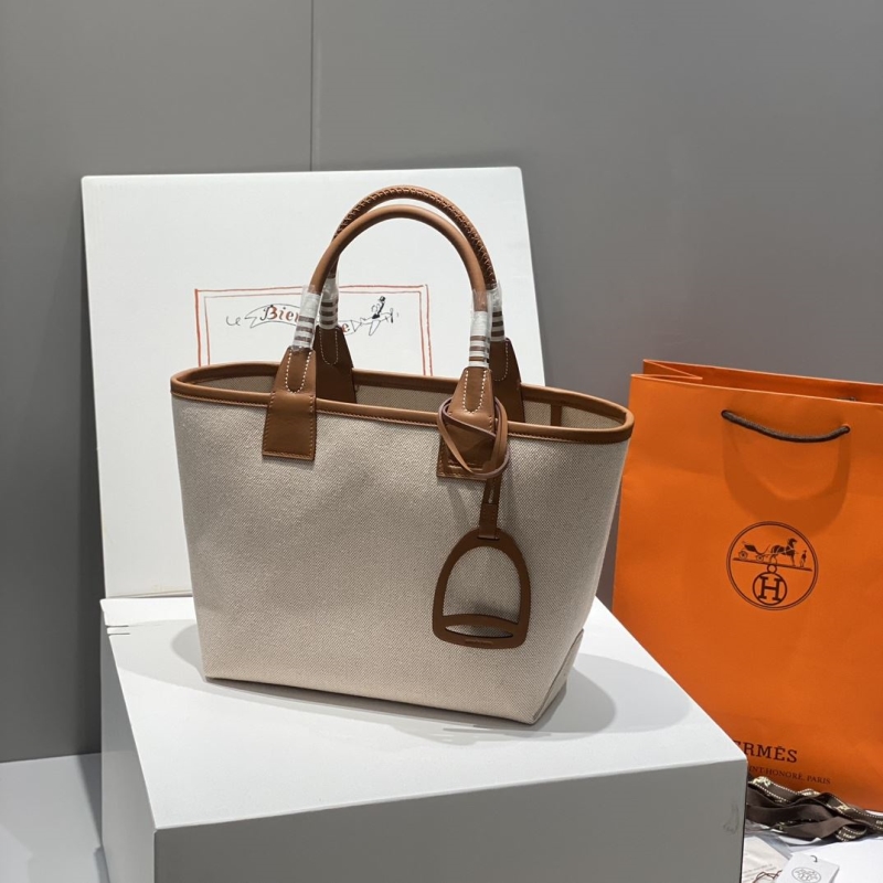 H**mes shopping bags